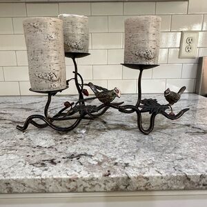 Candlestick holder metal sculpture.